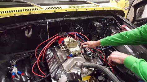car backfires through carburetor.
